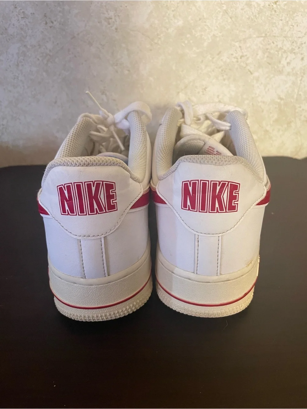 Nike Air Force 1 All-White Low Top Sneakers with Red Swoosh